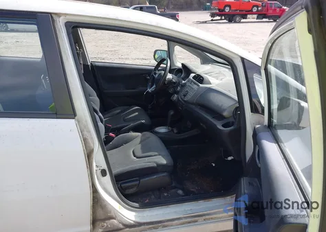 2009 Honda Fit Sport из США, поврежденный, VIN JHMGE884X9S042911